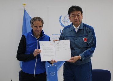 Signing at the IAEA Fukushima NPS office