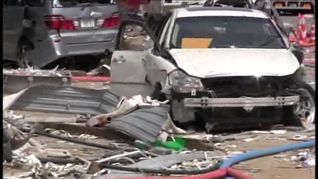 Car swept up by Tsunami