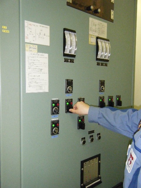 Valve operation on the AM panel in the Main Control Room