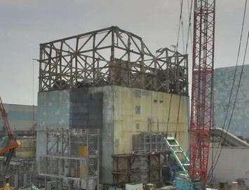 Unit 1 reactor building conditions (high-angle view)
