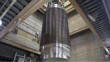 Moving the cask from the operating floor to the first floor of the reactor building