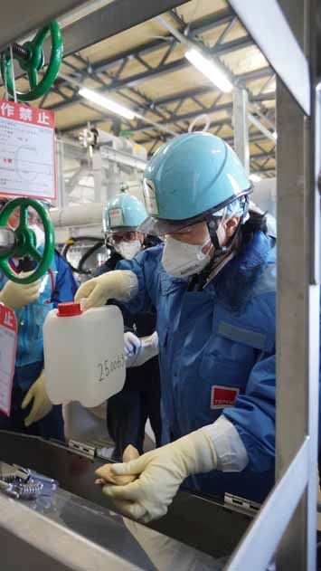 Sampling at the transfer facility (experts from People’s Republic of China laboratories)